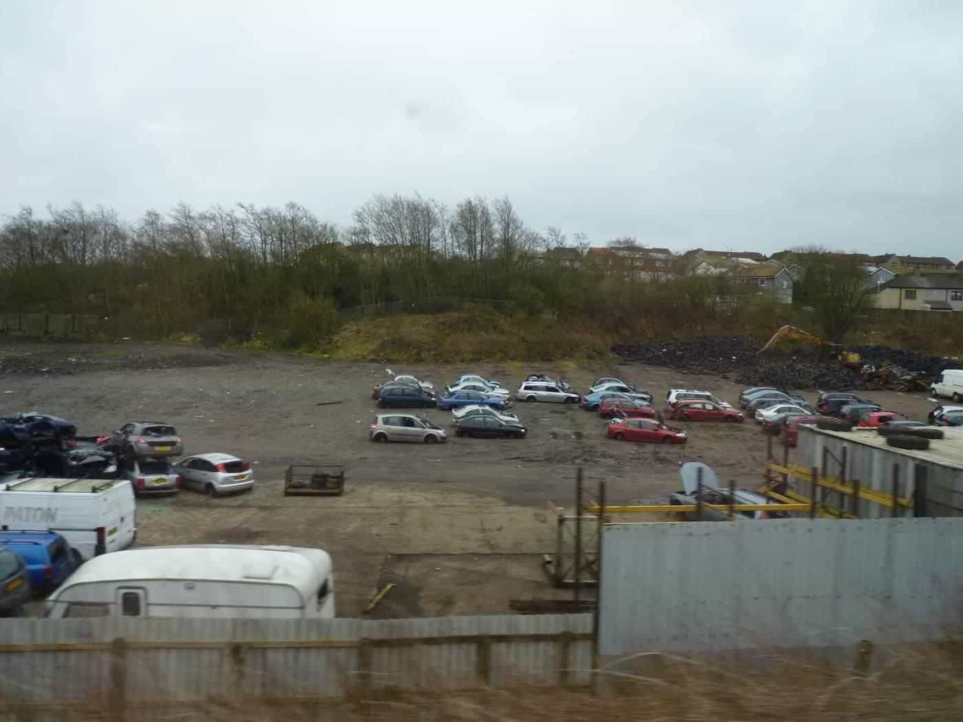 Rows of cars at a vehicle scrapyard